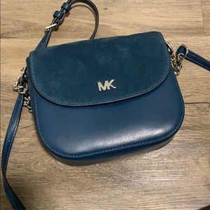 Michael Kors teal cross body.
